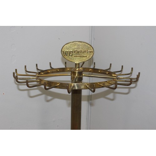 230 - Solid brass revolving shop display tie stand {140 cm H x 46 cm Dia.}.