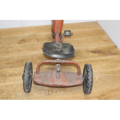 232 - Metal pedal tractor {72 cm H x 96 cm W x 52 cm D}.