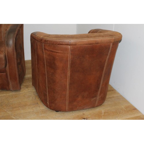 233 - Pair of leather upholstered  tub chairs {75 cm H x 73 cm W x 53 cm D}.