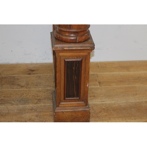 236 - Oak chimney piece decorated  with Corinthian columns {214 cm H x 184 cm W x 71 cm D}.