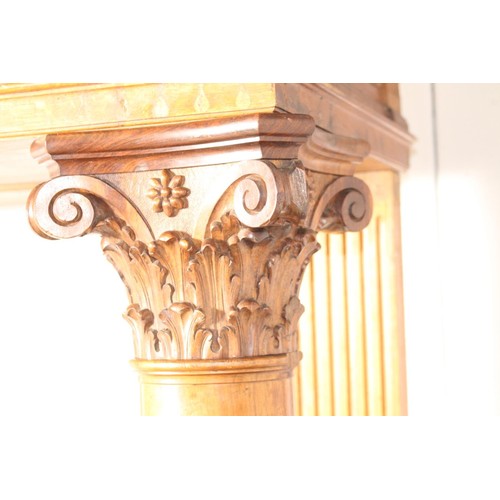 236 - Oak chimney piece decorated  with Corinthian columns {214 cm H x 184 cm W x 71 cm D}.