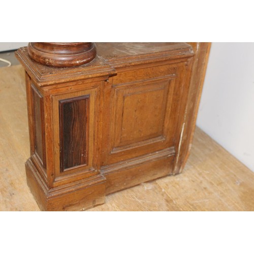 236 - Oak chimney piece decorated  with Corinthian columns {214 cm H x 184 cm W x 71 cm D}.