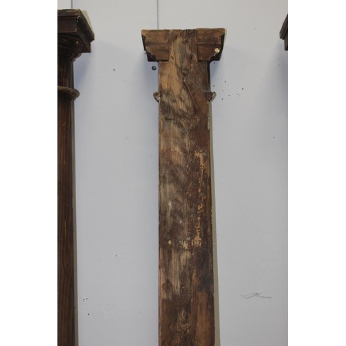 243 - Set of three pine columns {212 cm H x 22 cm W x 10 cm D}.