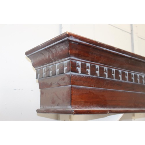 251 - Carved mahogany pediment with shell design {29 cm H x 147 cm W x 20 cm D}.