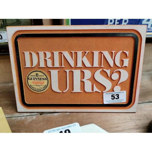 53 - Drinking Ours Guinness Perspex advertising sign {18 cm H x 26 cm W}.