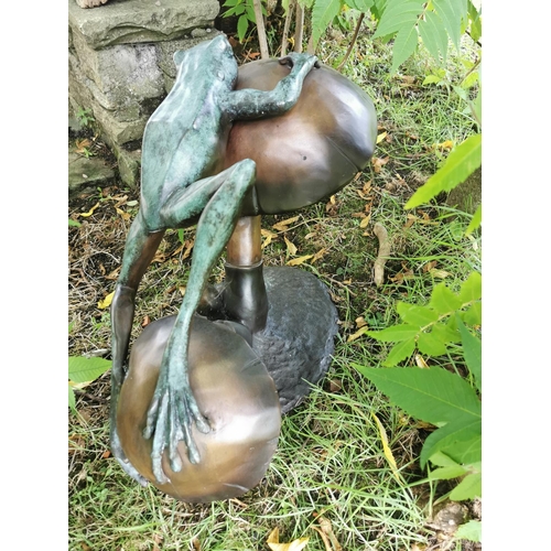 1 - Exceptional quality bronze sculture of Frog jumping the lily pads {52 cm H x 80 cm W x 40 cm D}.