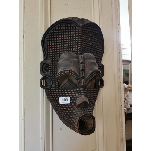 109 - African carved wooden mask { 36cm H X 32cm W X 17cm D }.