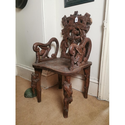 121 - Good quality carved oak black forest arm chair decorated with bears climbing trees and oak leaf {104... 