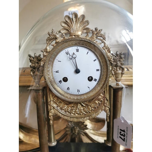 137 - 19th C. French mantle clock with enamel dial on black marble base {36 cm H x 20 cm W x 11 cm D}.