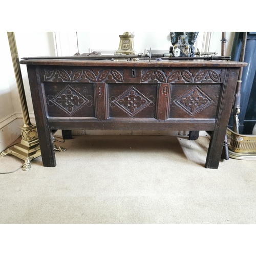 152 - 18th C. carved oak coffer on square reeded legs {75 cm H x 135 cm W x 52 cm D}.