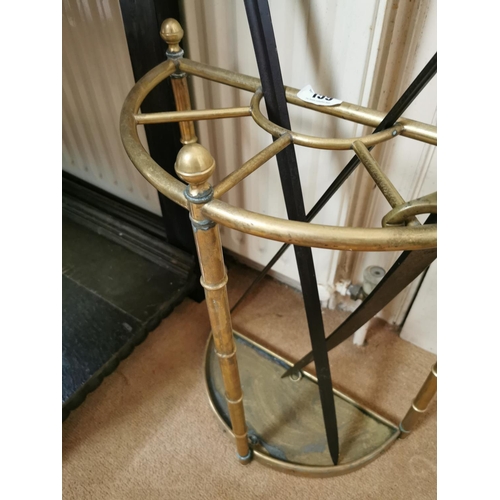 159 - Brass umbrella and stick stand { 62cm H X 45cm W X 21cm D }.