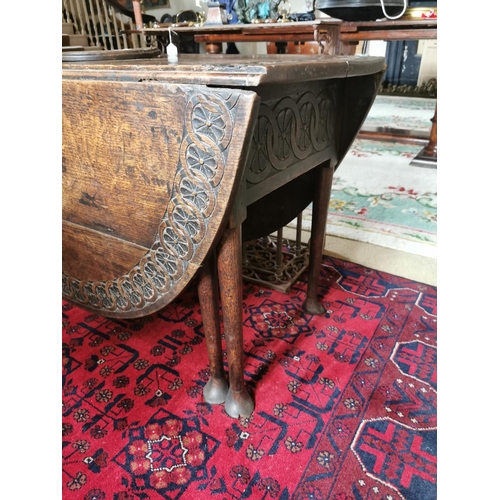 191 - 18th C. carved oak double drop leaf gate leg table raised on six legs on pad feet {68 cm H x 158 cm ... 