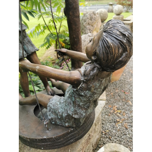 20 - Exceptional quality bronze sculture of two girls on a swing {145 cm H x 87 cm W x 70 cm D}.