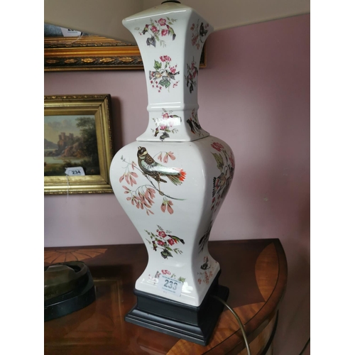 233 - Pair of decorative ceramic table lamps with birds and floral design {84 cm H x 33 cm W x 33 cm D}.