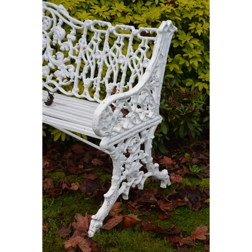 24 - Cast iron four seater garden bench {82 cm H x 180 cm W}.