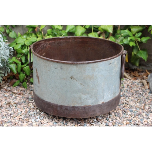 27 - Metal planter of round form with handles { 33cm H X 52cm Dia }.