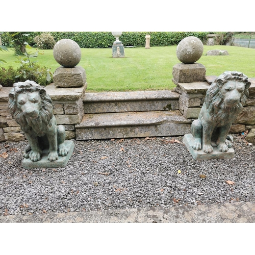 40 - Pair of exceptional quality bronze seated Lions {80 cm H x 42 cm W x 40 cm D}.