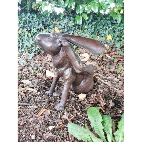 44 - Exceptional quality bronze sculpture of a Hare {37 cm H x 31 cm W x 32 cm D}.