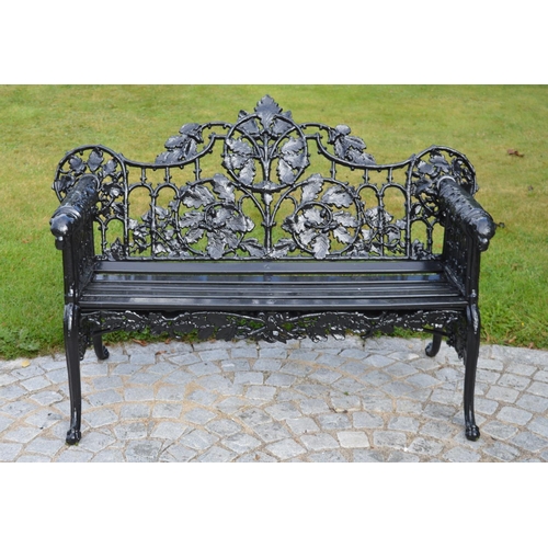 63 - Cast iron garden bench in the Coalbrookdale manner with arms treminating in dog's head. {96 cm H x 1... 