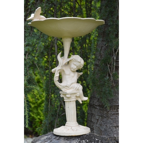 72 - Cast metal bird bath supported by cherub {56 cm H x 38 cm Dia}.