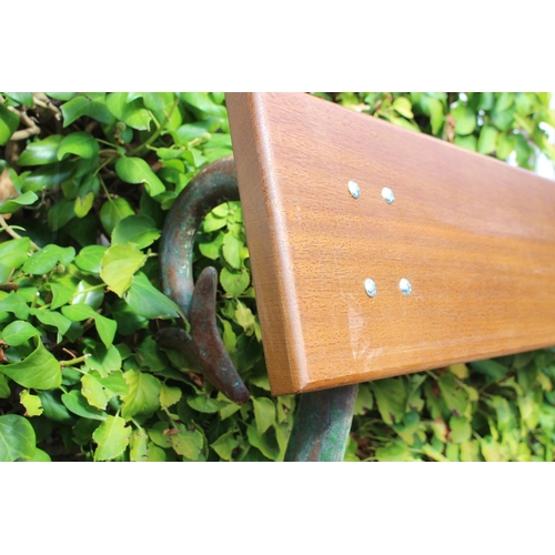 74 - Cast iron garden seat with wooden slats the supports in the form of swan's necks { 80cm H X 150cm W ... 