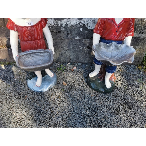 82 - Pair of early 20th. C. Cast iron figures of a Boy and a Girl in the form of bird baths { 92cm H X 31... 