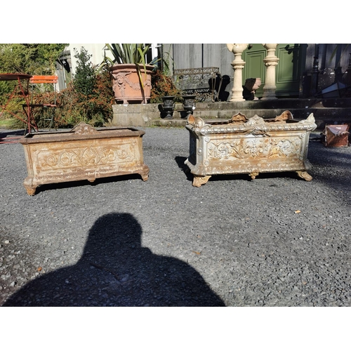 83 - Near pair of 19th. C. ornamental cast iron planters  { 37cm H X 64cm W X 33cm D }.