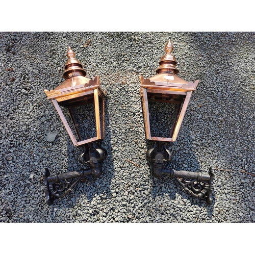 84 - Pair of metal and copper wall lanterns { 58cm H X 26cm W }.