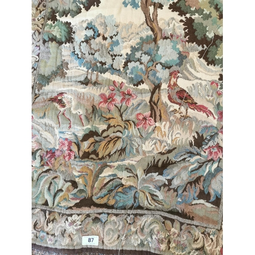 87 - Early 20th C. tapestry Woodland scene {135 cm H x 90 cm W}.