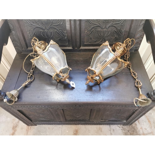 98 - Pair of decorative brass and glass hanging lanterns { 70cm H X 25cm Dia }.