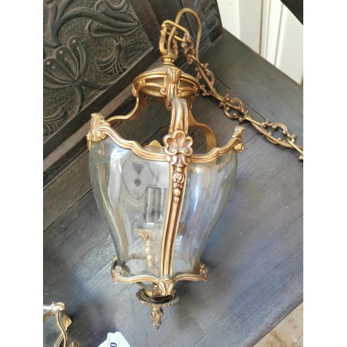 98 - Pair of decorative brass and glass hanging lanterns { 70cm H X 25cm Dia }.