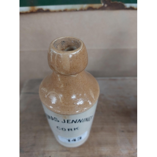 143 - Thomas Jennings Cork stoneware Ginger beer bottle. {17 cm H x 7 cm Dia}.