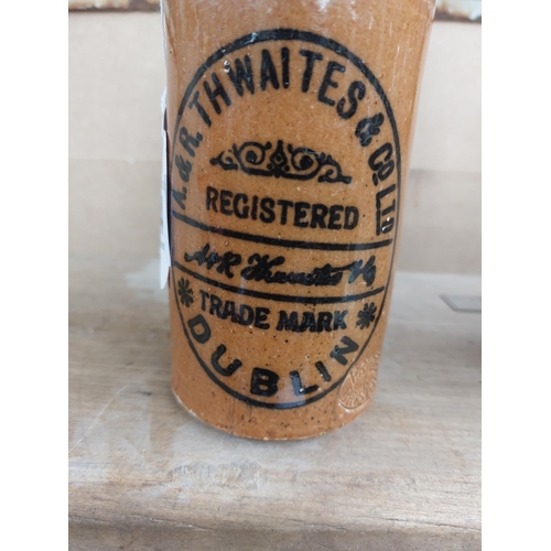 144 - A R Thwaites Dublin stoneware Ginger beer bottle. {17 cm H x 7 cm Dia}.