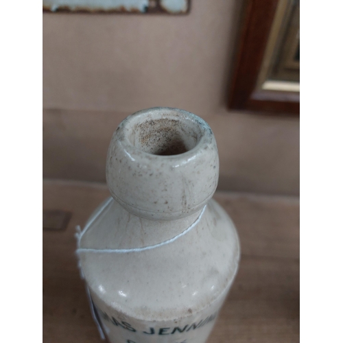 147 - Thomas Jennings Cork stoneware Ginger beer bottle. {17 cm H x 7 cm Dia}.