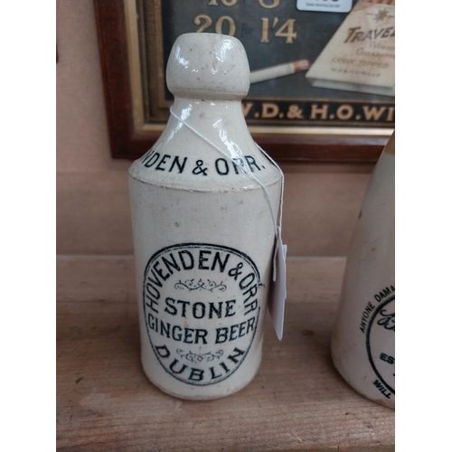 148 - Hovenden and Orr Dublin stoneware Ginger beer bottle. { 17 cm H x 7 cm Dia}.