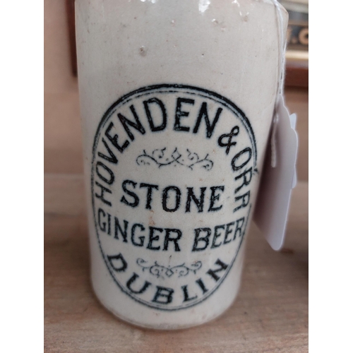 148 - Hovenden and Orr Dublin stoneware Ginger beer bottle. { 17 cm H x 7 cm Dia}.