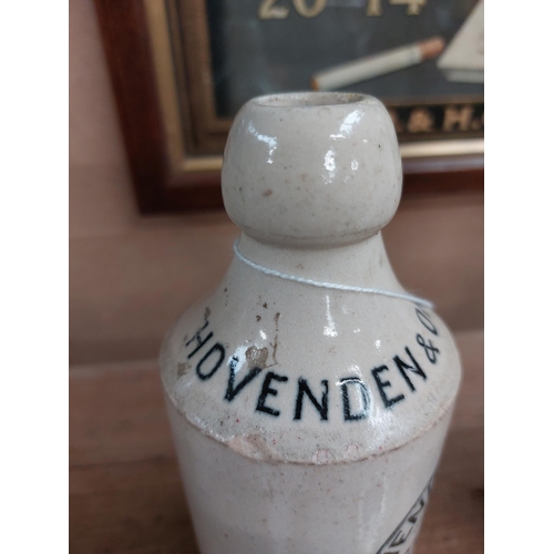 148 - Hovenden and Orr Dublin stoneware Ginger beer bottle. { 17 cm H x 7 cm Dia}.