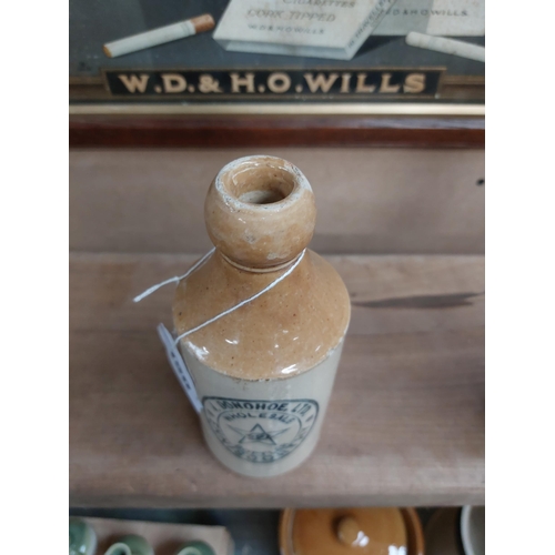 150 - J Donohoe Enniscorthy stoneware Ginger beer bottle. { 19cm H x 7 cm Dia}