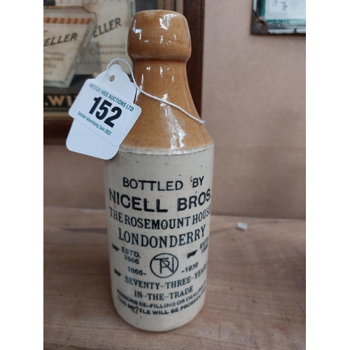 152 - Nicell Bros The Rosemount House Londonderry stoneware Ginger beer bottle. {20 cm H x 7 cm Dia}