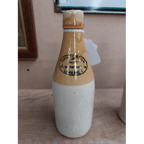 153 - John Keill Wine Merchant Limerick stoneware Ginger beer bottle. { 20 cm H x 7 cm Dia}