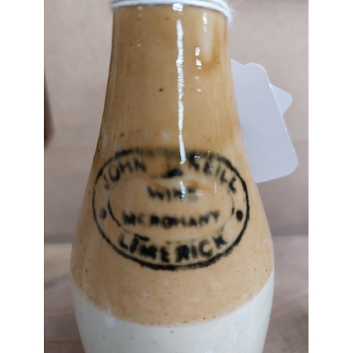 153 - John Keill Wine Merchant Limerick stoneware Ginger beer bottle. { 20 cm H x 7 cm Dia}