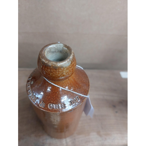 155 - Hovenden and Orr Ltd Dublin stoneware Ginger beer bottle. {17 cm H x 7 cm Dia}