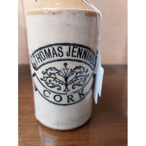 196 - Thomas Jennings Cork stoneware Ginger beer bottle. {17 cm H x 7 cm Dia}.