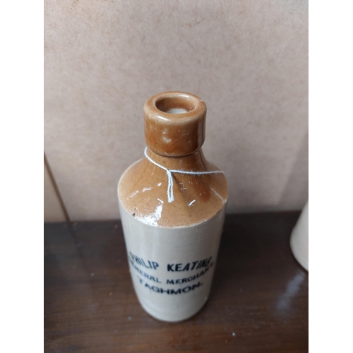 197 - Philip Keating General Merchant Taghmon stoneware Ginger beer bottle. {17 cm H x 7 cm Dia}