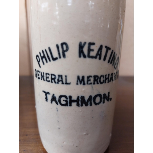 197 - Philip Keating General Merchant Taghmon stoneware Ginger beer bottle. {17 cm H x 7 cm Dia}