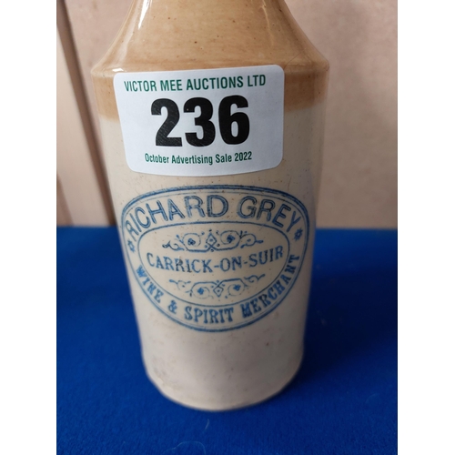 236 - Richard Grey Wine and Spirit Merchant Carrick on Suir stoneware Ginger beer bottle. {20 cm H x 7 cm ... 