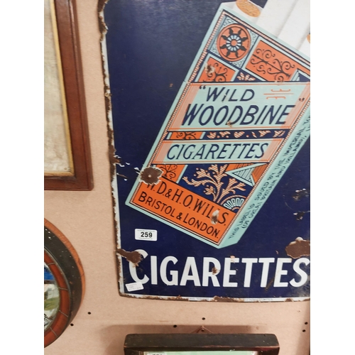 259 - Original Wild Woodbine Cigarettes enamel advertising sign. { 90 cm H x 45 cm W}.