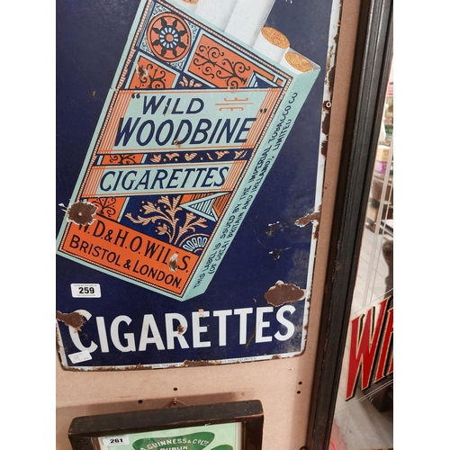 259 - Original Wild Woodbine Cigarettes enamel advertising sign. { 90 cm H x 45 cm W}.