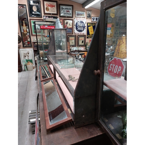 265 - Early 20th C. mahogany and glass counter display cabinet. {69 cm H x 240 cm W x 41 cm D}.