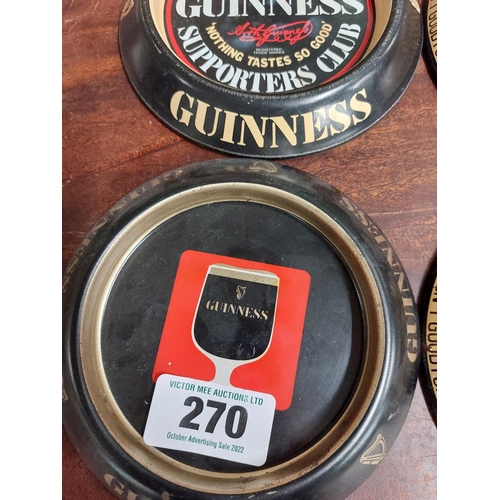 270 - Four tinplate Guinness ashtrays. {15 cm Dia}.